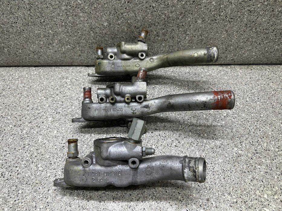 Корпус крышка блок термостат TD27 QD32 Ниссан Террано Мистраль Эльгран