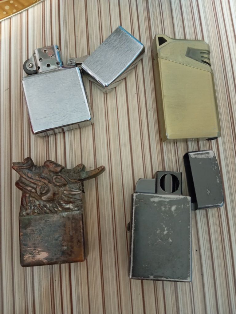 Зажигалка Zippo и разные 4 штуки одна на бензине, 3 на газу