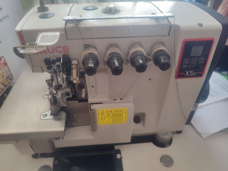 Продам оверлок швейная машинка