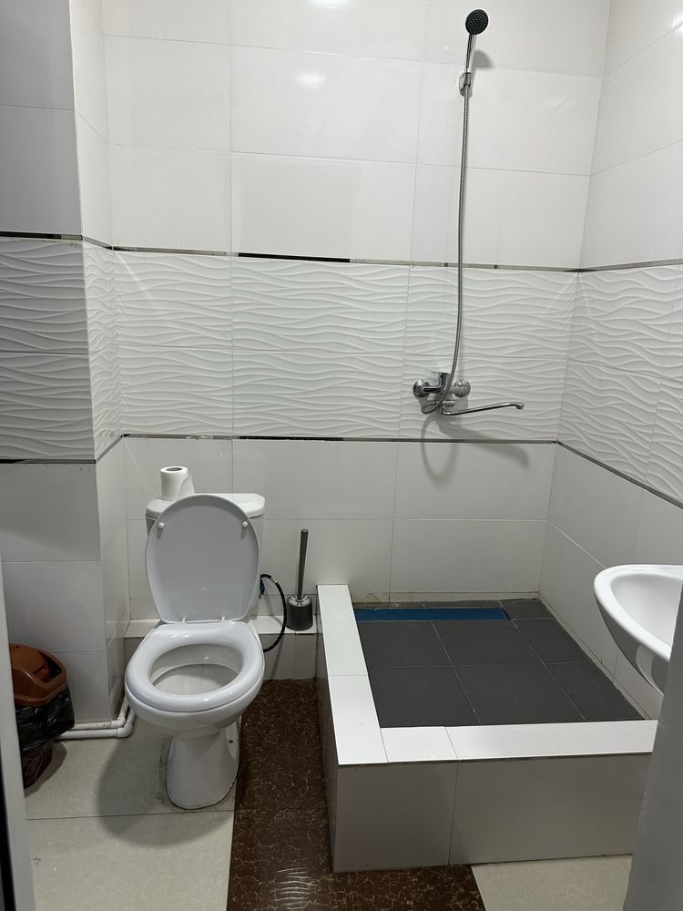 Bez zaks Hotel TJJ mehmonxonasi