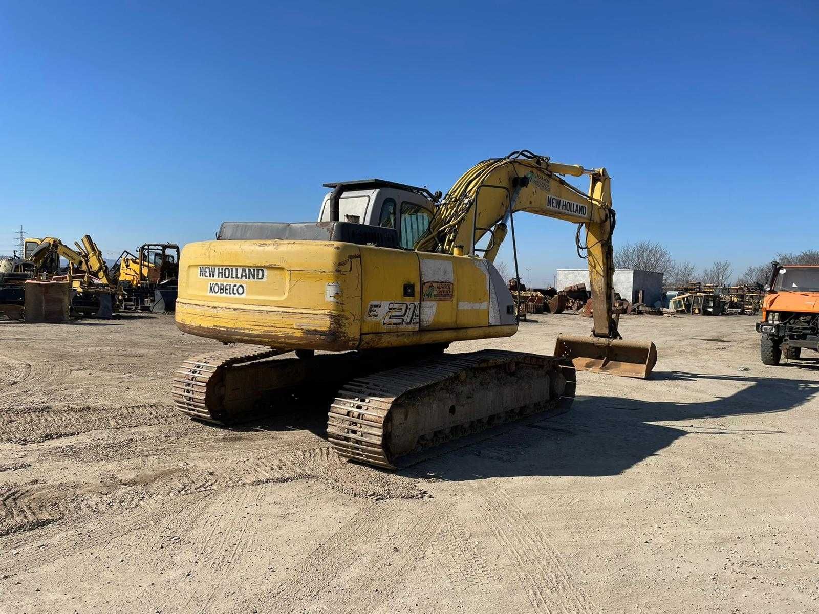 Excavator senile New Holland E 215 dezmembrez