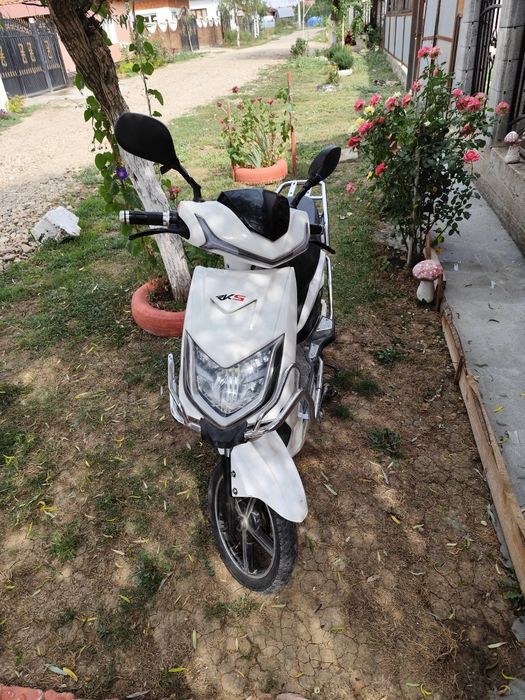 Vând scuter electric bateri noi pe el  25 km la ora