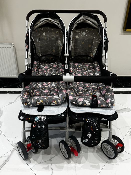 Детская прогулочная коляска для двойни