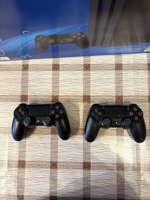 PlayStation 4 Pro 1TB - с подарък 6 игри