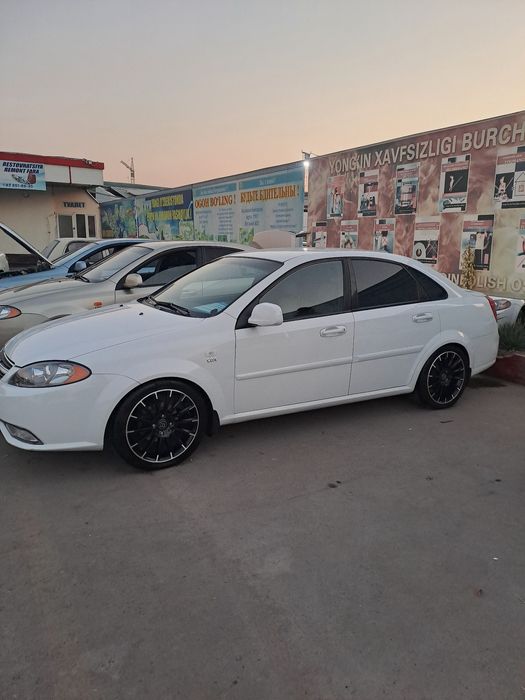 Ласетти 2011 автомат жентра килинган