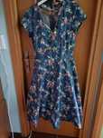 Rochie  din bumbac albastra cu flori multicolore.
