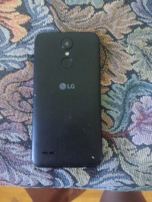 Tel LG 4 cu încărcător cu tot