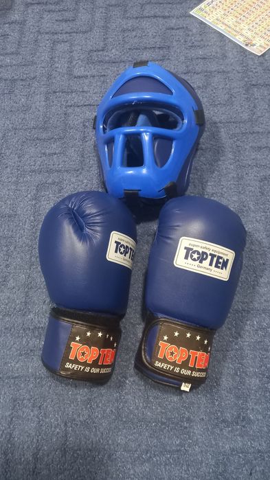 Продам боксёрские перчатки со шлемом новые