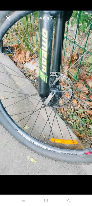 Vând bicicleta Omega roti 28 frînă pe disc schimbătoare Shimano