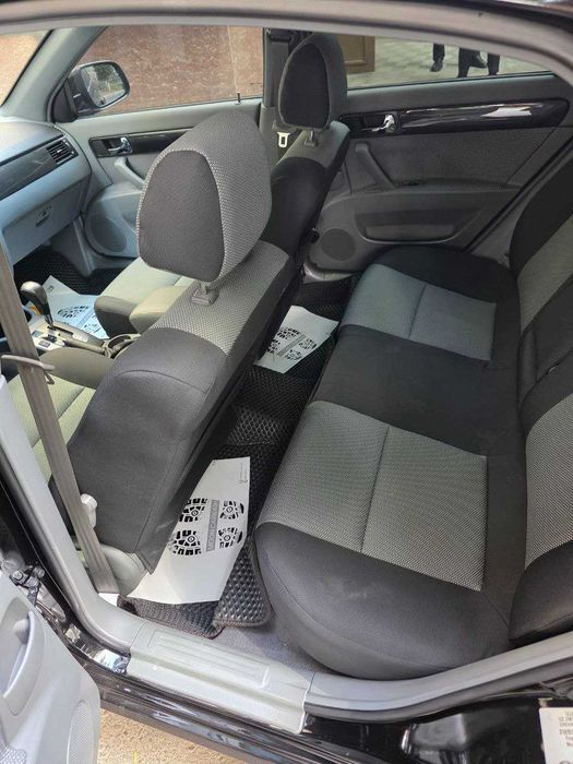 Продается Chevrolet Gentra AT. Чёрный Full позиция