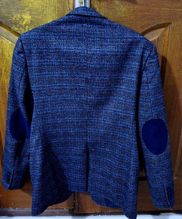 Шерстяной пиджак синего цвета