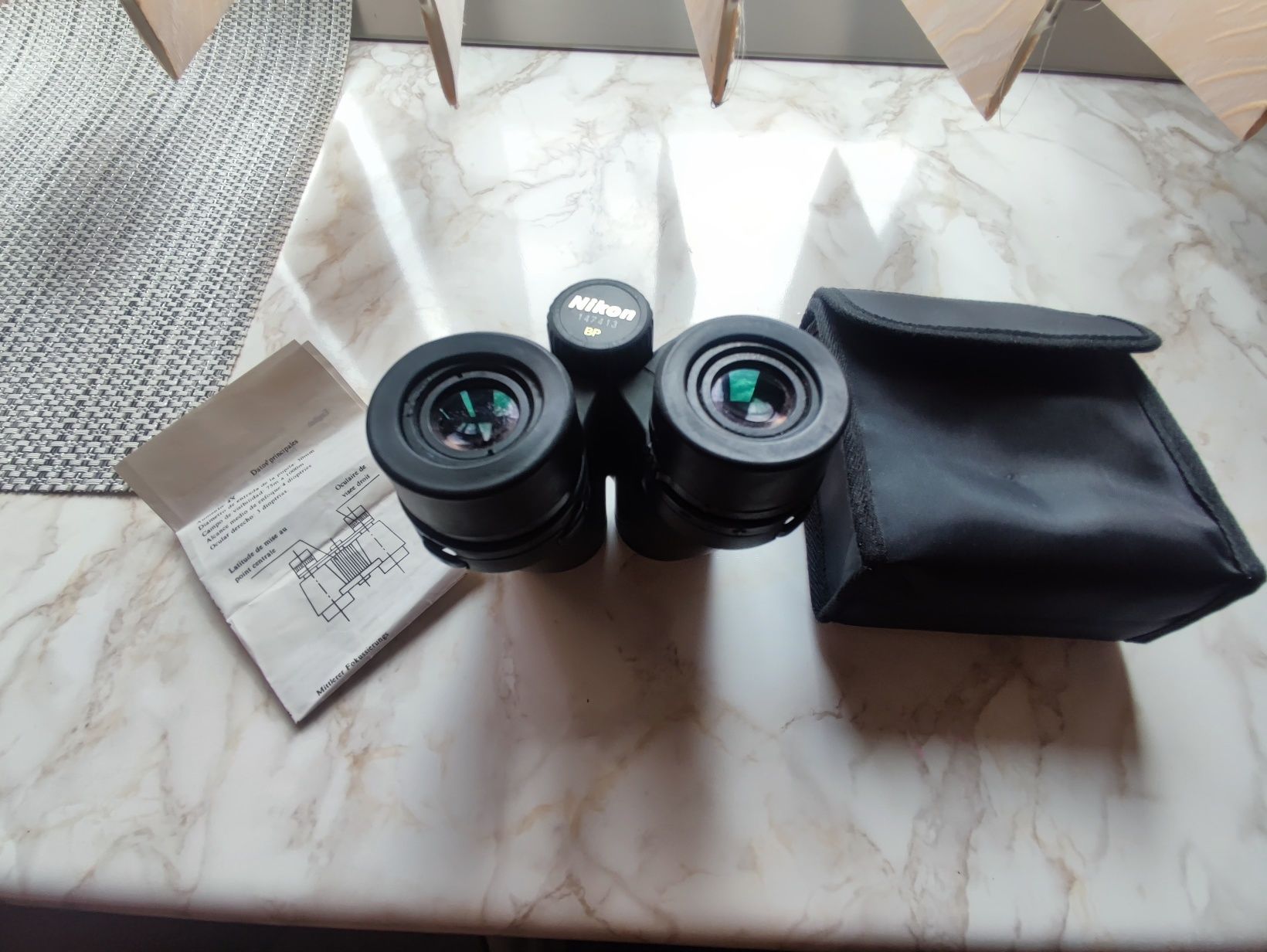 BINOCLU NIKON 
Detalii conținut