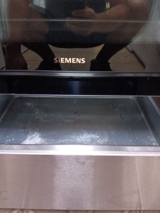 Иноксова свободно стояща печка с индукционни котлони Сименс Siemens