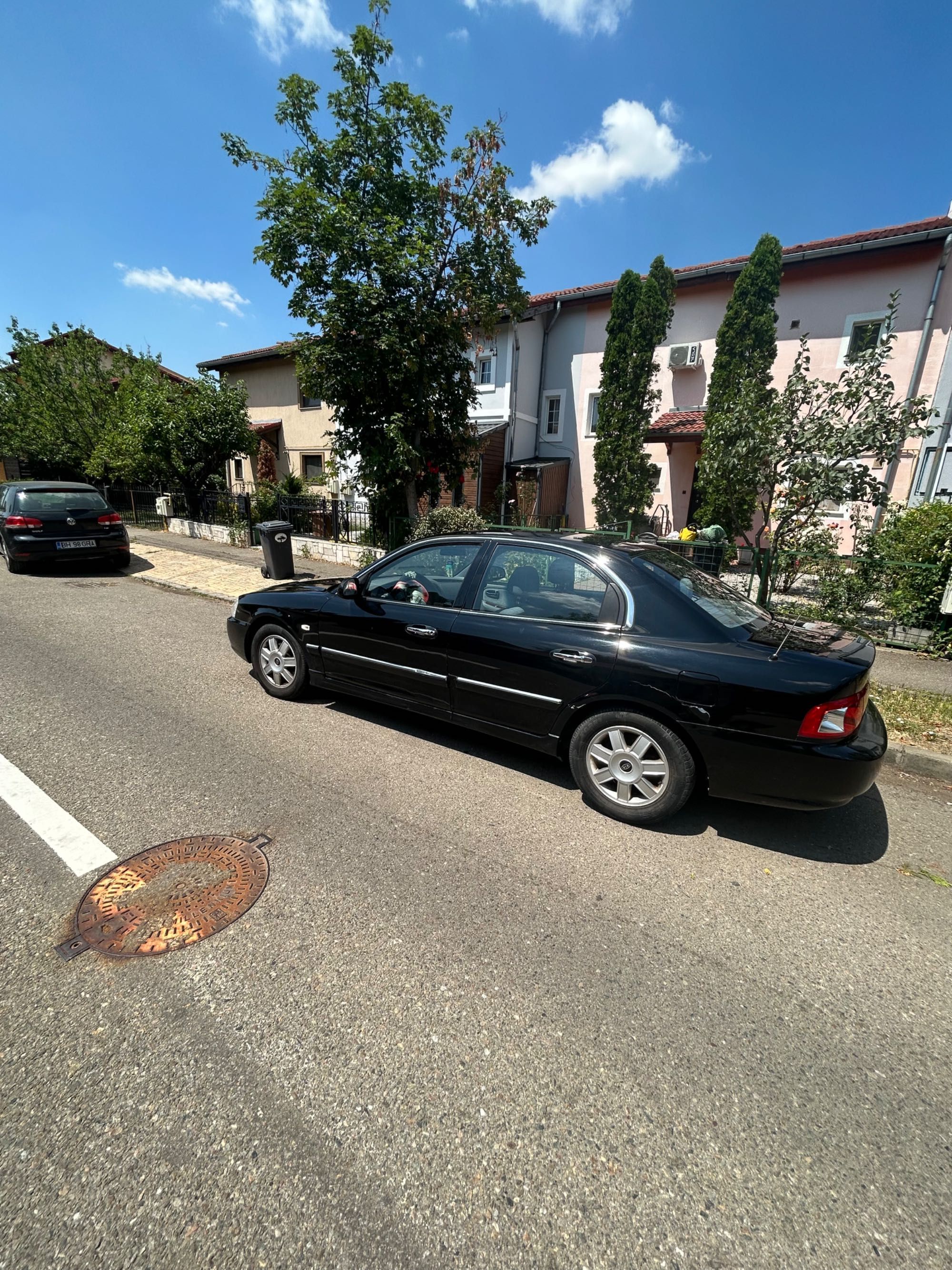 AutoKia Magentis