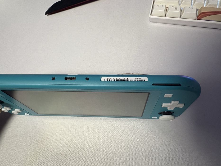 Nintendo Switch Lite +7 jocuri