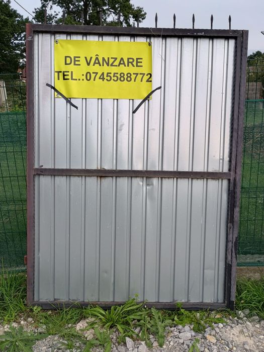 Vând poarta detalii la telefon