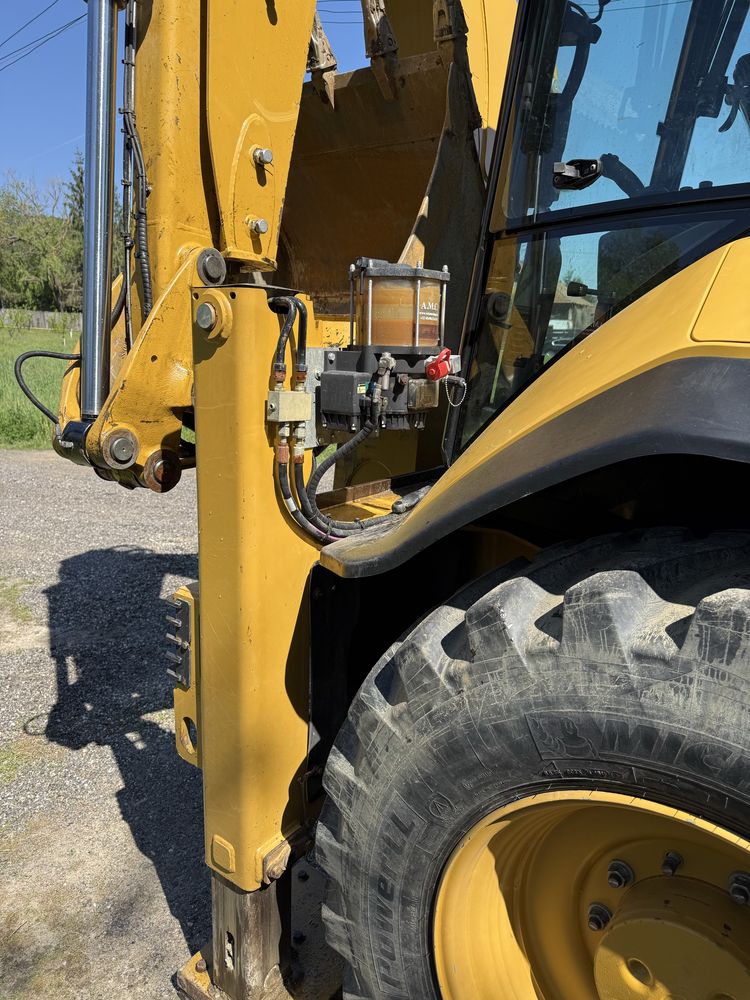 Buldoexcavator Caterpillar 444 F2