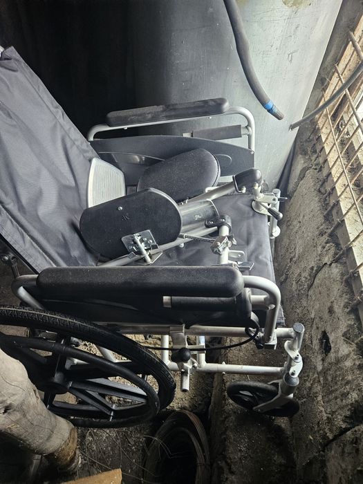 Инвалидное кресло .