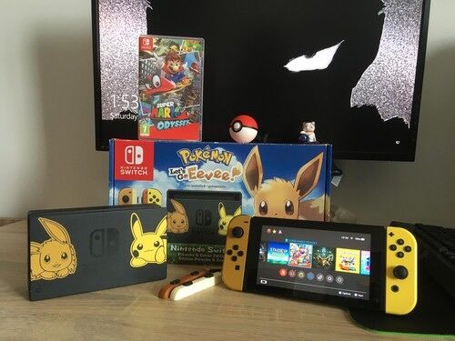 Nintendo Switch Eevee edition + 4 jocuri