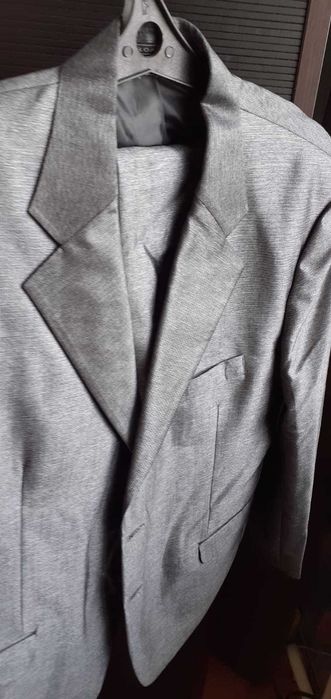 Продам Новый костюм мужской