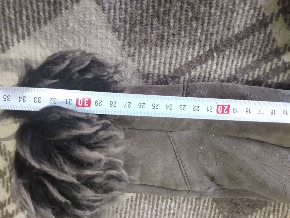 Детски кожух от естествена кожа за момиче .