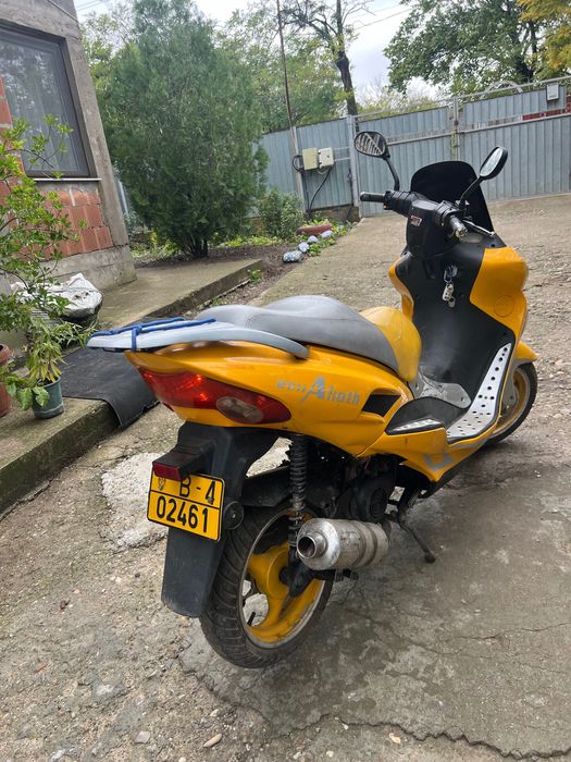Vând motocicletă electrică