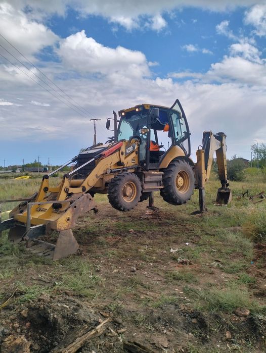 Аренда спецтехники экскаватор погрузчик 3в1 CAT