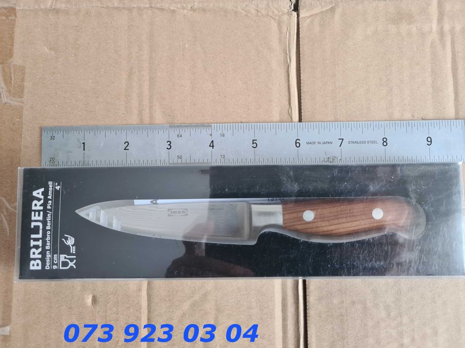 Cuțit cu lamă mică din oțel VG-10 și laterale din oțel Damasc.