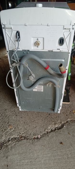 Mașină cu încărcare verticală