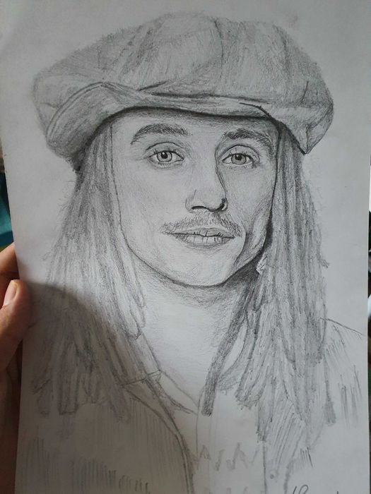 Portret în creion sau cărbune