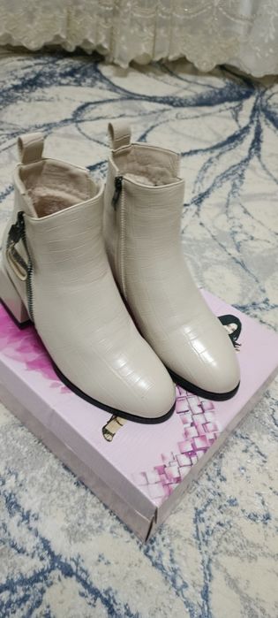 Qishki etik holati ideal kiyilmagan