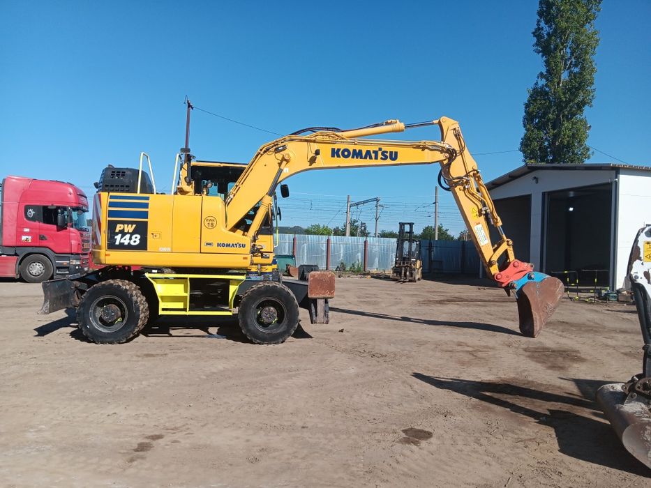 Vând sau schimb excavator komatsu PW 148
