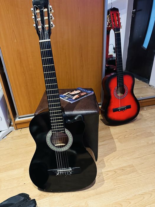 Chitara  acustica  doua la pret de una