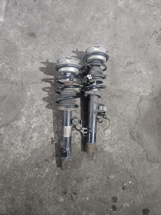 Amortizoare față stânga dreapta cu arc și flanșă BMW seria 3 seria 1