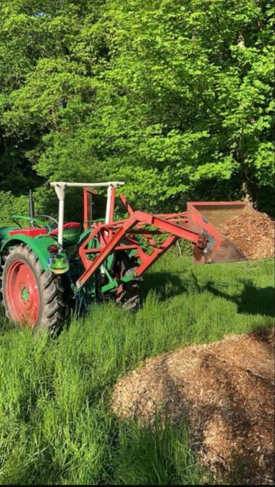 Încărcător în tiranți