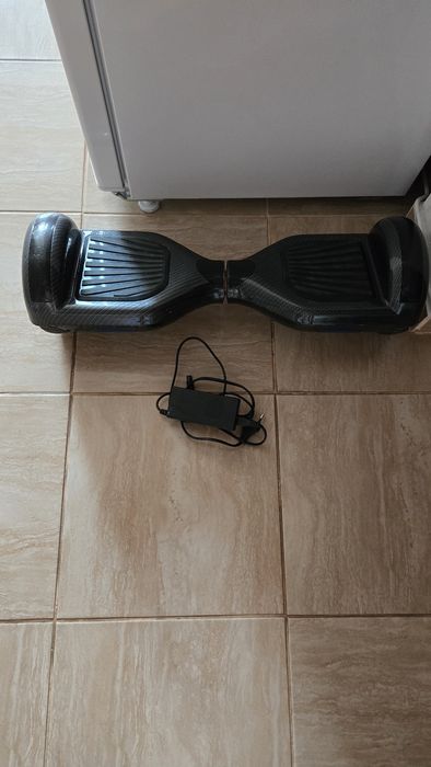 Vând hoverboard carbon
