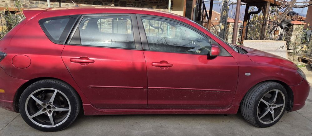 Мазда 3, 2004 година