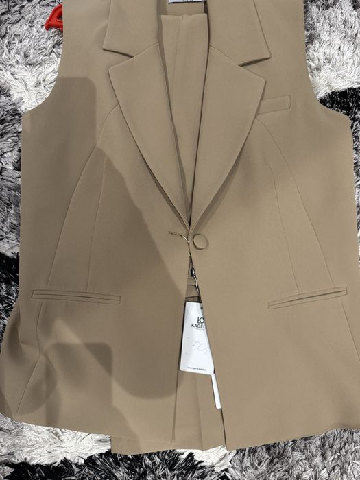 Костюм новый 42