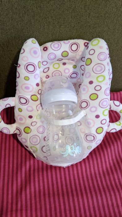 Perna suport pentru biberon bebelusi