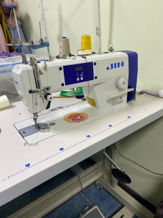 Jin тігін машина.