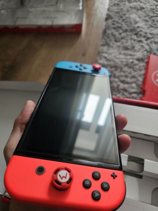 Nintendo Switch OLED – ca nou, garanție emag 2026 + multe accesorii