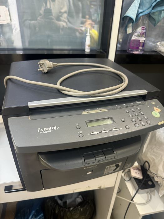 Продам лазерный 3в1 МФУ принтер Canon MF4018