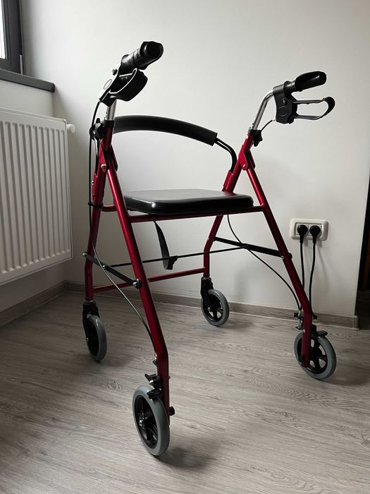 Cadru mergator pliabil cu 4 roti, scaun odihna, frane auto-blocante