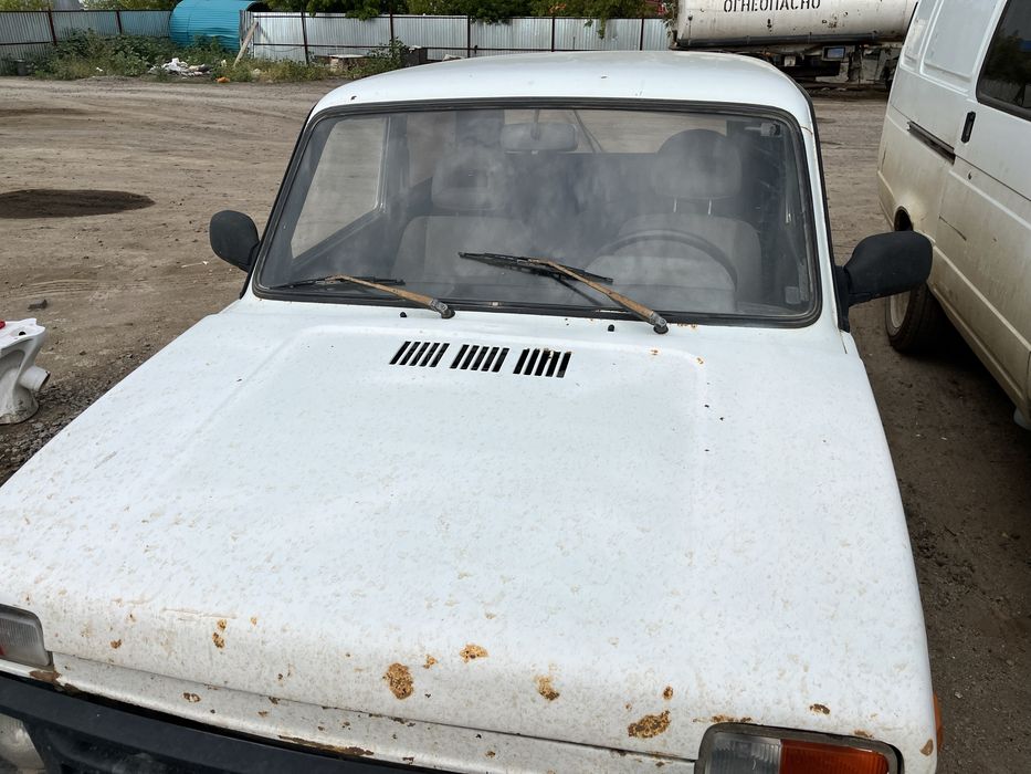продам ниву на ходу газ бензин есть вложения по кузову на фоте видно т
