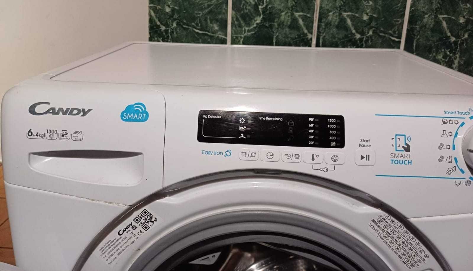 Masină de spălat cu uscator si calcare usoara Candy smart touch.