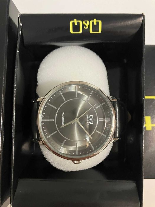 Ceas original Q&Q model CQAQWB1, stare excelentă, purtat foarte rar.