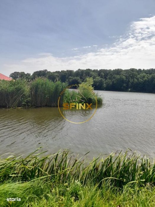 Teren cu autorizatie 3 case Caldarusani lac/padure 2700 mp, 85 ml desc