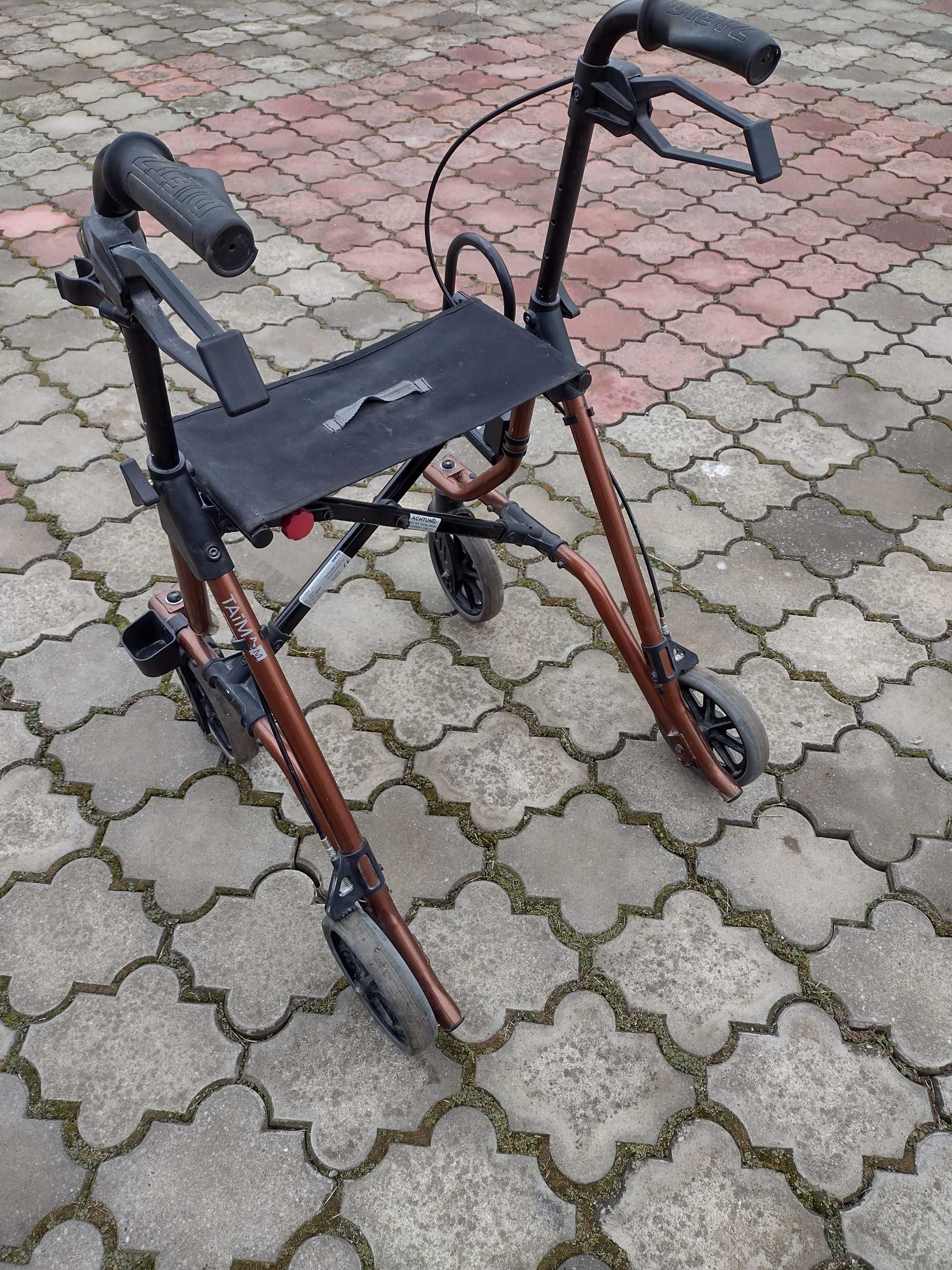 Cadru pliabil cu scaun si roti , carucior