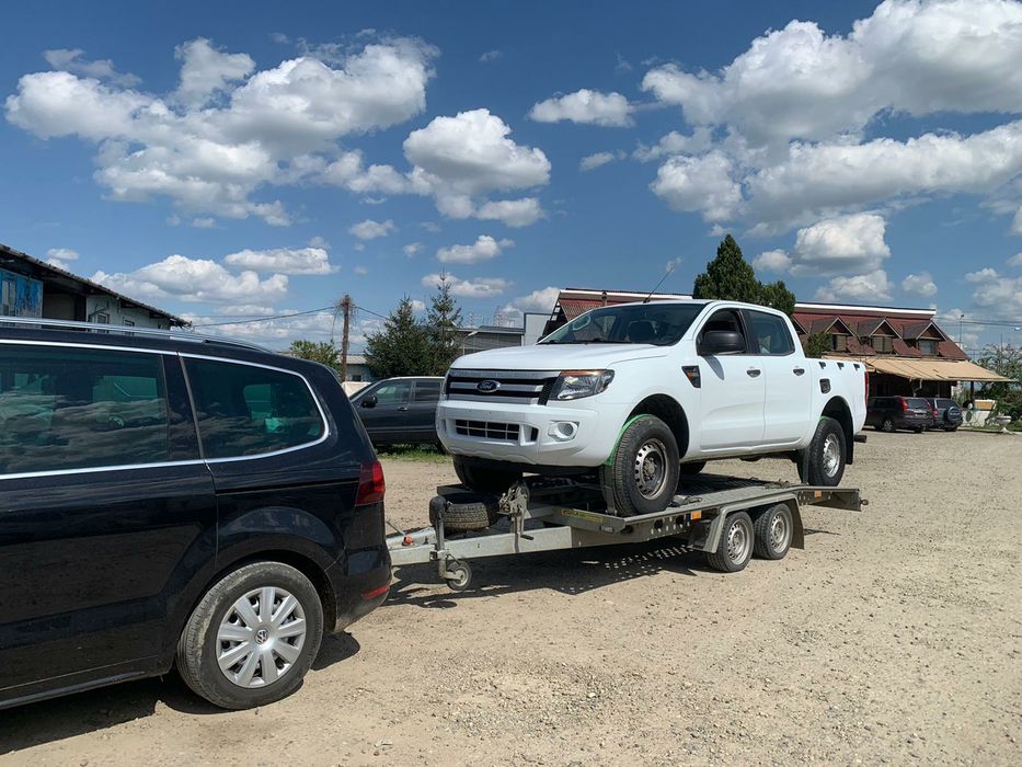 Tractari  auto cu platformă si 5 pers