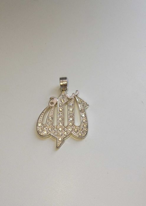 Продам кулон с камнями